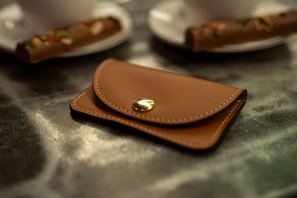 Black Zipped leather coin purse | Comme des Garçons Wallet | MATCHES UK